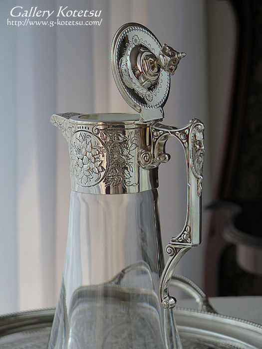 VoNbgWO antique silver claret jug