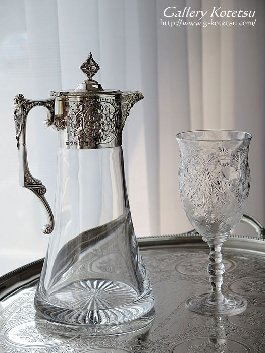 VoNbgWO antique silver claret jug